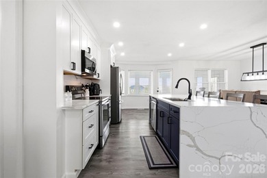 Welcome to luxury living in the highly sought-after Woodbridge on Woodbridge Golf Links in North Carolina - for sale on GolfHomes.com, golf home, golf lot