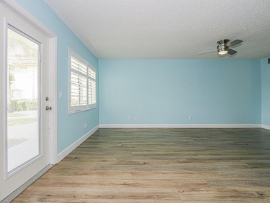 Spacious first floor condominium in vibrant 55+ community- on Vero Beach South Golf Course in Florida - for sale on GolfHomes.com, golf home, golf lot