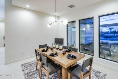 Modern luxury meets effortless desert living in this striking on London Bridge Golf Course in Arizona - for sale on GolfHomes.com, golf home, golf lot