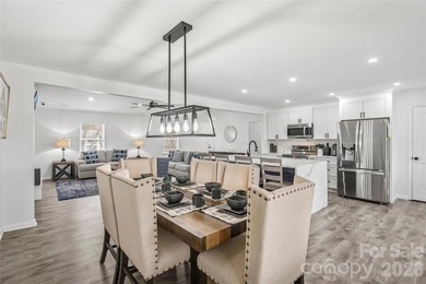 Welcome to luxury living in the highly sought-after Woodbridge on Woodbridge Golf Links in North Carolina - for sale on GolfHomes.com, golf home, golf lot