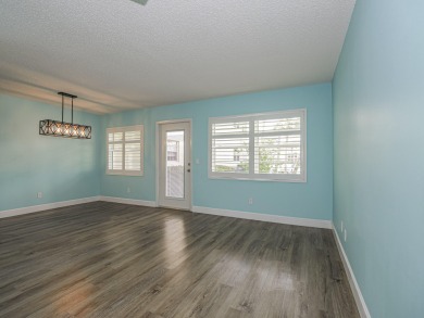 Spacious first floor condominium  in vibrant 55+ community- on Vero Beach South Golf Course in Florida - for sale on GolfHomes.com, golf home, golf lot