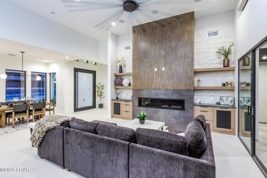 Modern luxury meets effortless desert living in this striking on London Bridge Golf Course in Arizona - for sale on GolfHomes.com, golf home, golf lot