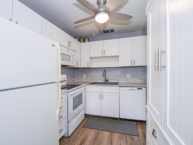 Spacious first floor condominium in vibrant 55+ community- on Vero Beach South Golf Course in Florida - for sale on GolfHomes.com, golf home, golf lot