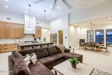 Modern luxury meets effortless desert living in this striking on London Bridge Golf Course in Arizona - for sale on GolfHomes.com, golf home, golf lot