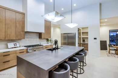 Modern luxury meets effortless desert living in this striking on London Bridge Golf Course in Arizona - for sale on GolfHomes.com, golf home, golf lot