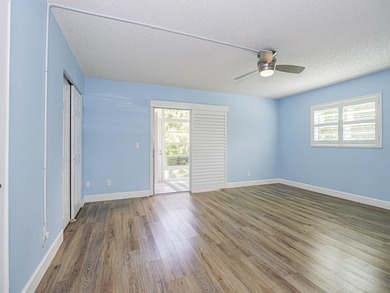 Spacious first floor condominium in vibrant 55+ community- on Vero Beach South Golf Course in Florida - for sale on GolfHomes.com, golf home, golf lot