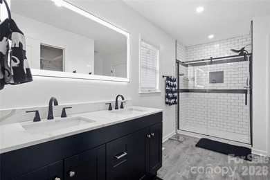 Welcome to luxury living in the highly sought-after Woodbridge on Woodbridge Golf Links in North Carolina - for sale on GolfHomes.com, golf home, golf lot