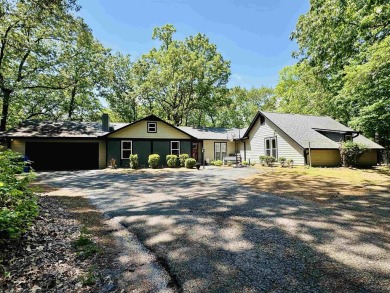 This spacious 4 (possibly 5) bedroom, 2 bathroom home is nestled on Selmer Country Club in Tennessee - for sale on GolfHomes.com, golf home, golf lot