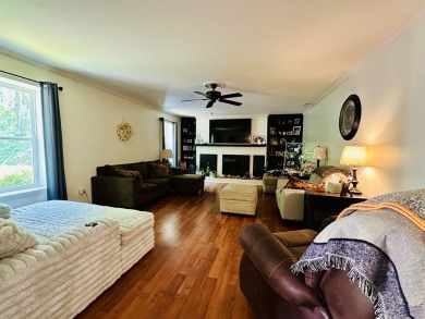 This spacious 4 (possibly 5) bedroom, 2 bathroom home is nestled on Selmer Country Club in Tennessee - for sale on GolfHomes.com, golf home, golf lot