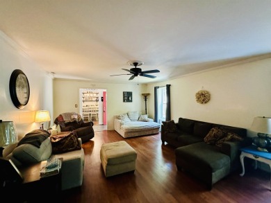 This spacious 4 (possibly 5) bedroom, 2 bathroom home is nestled on Selmer Country Club in Tennessee - for sale on GolfHomes.com, golf home, golf lot