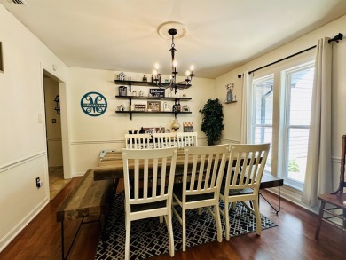 This spacious 4 (possibly 5) bedroom, 2 bathroom home is nestled on Selmer Country Club in Tennessee - for sale on GolfHomes.com, golf home, golf lot