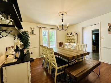This spacious 4 (possibly 5) bedroom, 2 bathroom home is nestled on Selmer Country Club in Tennessee - for sale on GolfHomes.com, golf home, golf lot