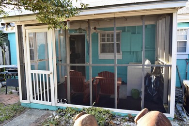 Discover relaxed coastal living in this charming cottage-style on St. James Bay in Florida - for sale on GolfHomes.com, golf home, golf lot