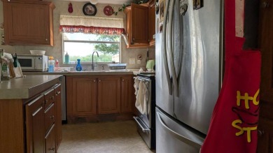Motivated Seller - Bring All Offers!    Discover this charming on Plantation Golf Club in Florida - for sale on GolfHomes.com, golf home, golf lot