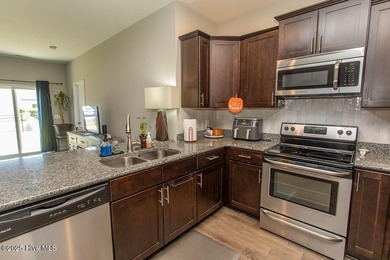 Wonderfully maintained one-level home on a corner lot in the on Crow Creek Golf Club in North Carolina - for sale on GolfHomes.com, golf home, golf lot