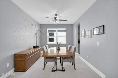 Live the laid-back dream in this vibrant Parrot model home! on LPGA International Golf Course in Florida - for sale on GolfHomes.com, golf home, golf lot