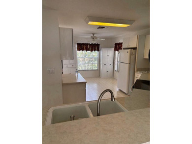 Nestled in the desirable High Vista HOA of Ridgewood Lakes, this on Ridgewood Lakes Golf and Country Club in Florida - for sale on GolfHomes.com, golf home, golf lot
