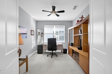 Live the laid-back dream in this vibrant Parrot model home! on LPGA International Golf Course in Florida - for sale on GolfHomes.com, golf home, golf lot