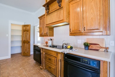 This stunning 5-bdrm, 3.5-bath home has been beautifully on Bentwood Country Club in Texas - for sale on GolfHomes.com, golf home, golf lot