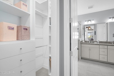 Live the laid-back dream in this vibrant Parrot model home! on LPGA International Golf Course in Florida - for sale on GolfHomes.com, golf home, golf lot