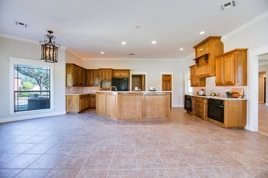 This stunning 5-bdrm, 3.5-bath home has been beautifully on Bentwood Country Club in Texas - for sale on GolfHomes.com, golf home, golf lot