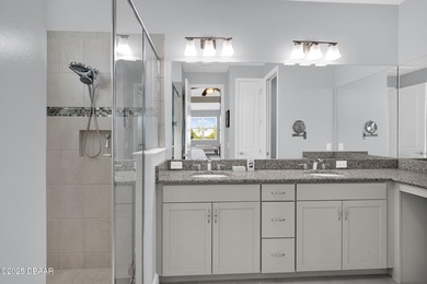 Live the laid-back dream in this vibrant Parrot model home! on LPGA International Golf Course in Florida - for sale on GolfHomes.com, golf home, golf lot