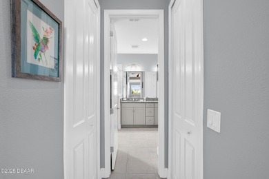 Live the laid-back dream in this vibrant Parrot model home! on LPGA International Golf Course in Florida - for sale on GolfHomes.com, golf home, golf lot