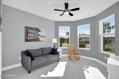 Live the laid-back dream in this vibrant Parrot model home! on LPGA International Golf Course in Florida - for sale on GolfHomes.com, golf home, golf lot