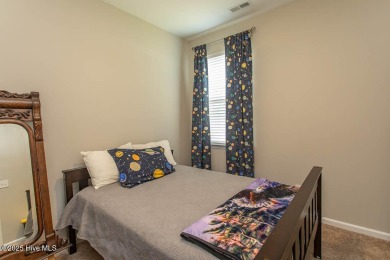 Wonderfully maintained one-level home on a corner lot in the on Crow Creek Golf Club in North Carolina - for sale on GolfHomes.com, golf home, golf lot