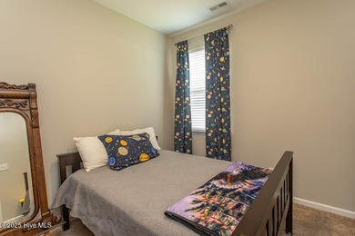 Wonderfully maintained one-level home on a corner lot in the on Crow Creek Golf Club in North Carolina - for sale on GolfHomes.com, golf home, golf lot