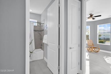 Live the laid-back dream in this vibrant Parrot model home! on LPGA International Golf Course in Florida - for sale on GolfHomes.com, golf home, golf lot