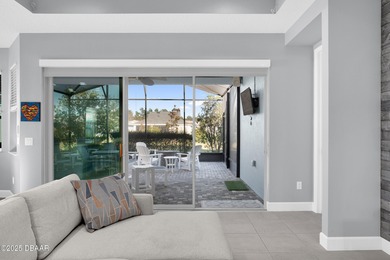 Live the laid-back dream in this vibrant Parrot model home! on LPGA International Golf Course in Florida - for sale on GolfHomes.com, golf home, golf lot