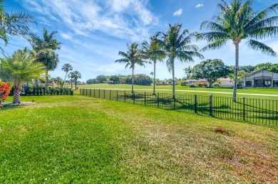 Nestled in the heart of Boca Woods Country Club, this home sits on Boca Woods Country Club in Florida - for sale on GolfHomes.com, golf home, golf lot