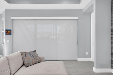 Live the laid-back dream in this vibrant Parrot model home! on LPGA International Golf Course in Florida - for sale on GolfHomes.com, golf home, golf lot