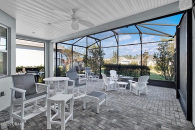 Live the laid-back dream in this vibrant Parrot model home! on LPGA International Golf Course in Florida - for sale on GolfHomes.com, golf home, golf lot