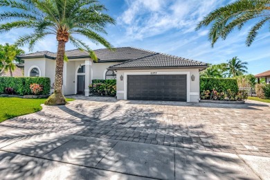 Nestled in the heart of Boca Woods Country Club, this home sits on Boca Woods Country Club in Florida - for sale on GolfHomes.com, golf home, golf lot