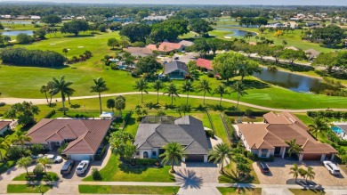 Nestled in the heart of Boca Woods Country Club, this home sits on Boca Woods Country Club in Florida - for sale on GolfHomes.com, golf home, golf lot