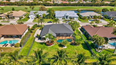 Nestled in the heart of Boca Woods Country Club, this home sits on Boca Woods Country Club in Florida - for sale on GolfHomes.com, golf home, golf lot