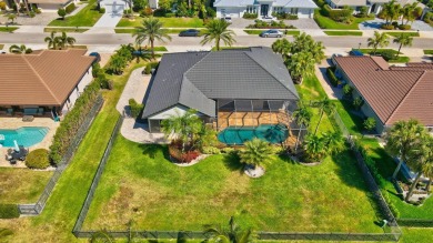 Nestled in the heart of Boca Woods Country Club, this home sits on Boca Woods Country Club in Florida - for sale on GolfHomes.com, golf home, golf lot