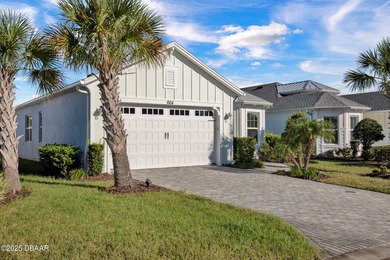 Live the laid-back dream in this vibrant Parrot model home! on LPGA International Golf Course in Florida - for sale on GolfHomes.com, golf home, golf lot