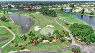 Nestled in the heart of Boca Woods Country Club, this home sits on Boca Woods Country Club in Florida - for sale on GolfHomes.com, golf home, golf lot
