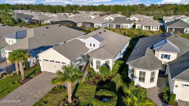 Live the laid-back dream in this vibrant Parrot model home! on LPGA International Golf Course in Florida - for sale on GolfHomes.com, golf home, golf lot