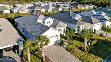 Live the laid-back dream in this vibrant Parrot model home! on LPGA International Golf Course in Florida - for sale on GolfHomes.com, golf home, golf lot