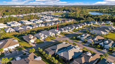 Live the laid-back dream in this vibrant Parrot model home! on LPGA International Golf Course in Florida - for sale on GolfHomes.com, golf home, golf lot