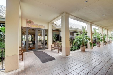 Nestled in the heart of Boca Woods Country Club, this home sits on Boca Woods Country Club in Florida - for sale on GolfHomes.com, golf home, golf lot