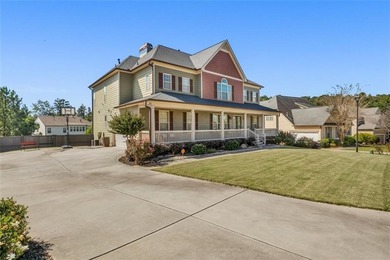 Experience luxury living in this expansive 5,300+ sq ft, 6BR/5BA on Mirror Lake Golf Club in Georgia - for sale on GolfHomes.com, golf home, golf lot