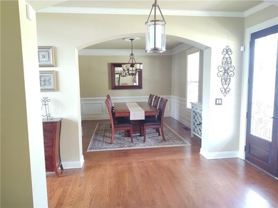 Experience luxury living in this expansive 5,300+ sq ft, 6BR/5BA on Mirror Lake Golf Club in Georgia - for sale on GolfHomes.com, golf home, golf lot