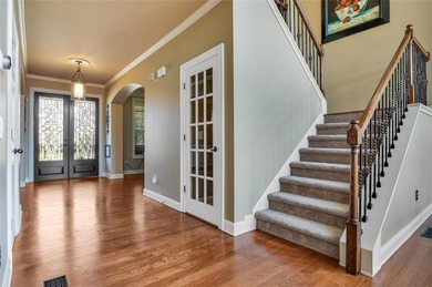 Experience luxury living in this expansive 5,300+ sq ft, 6BR/5BA on Mirror Lake Golf Club in Georgia - for sale on GolfHomes.com, golf home, golf lot