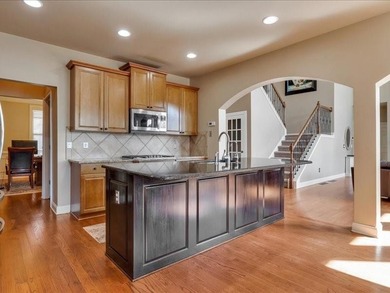 Experience luxury living in this expansive 5,300+ sq ft, 6BR/5BA on Mirror Lake Golf Club in Georgia - for sale on GolfHomes.com, golf home, golf lot