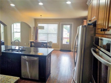 Experience luxury living in this expansive 5,300+ sq ft, 6BR/5BA on Mirror Lake Golf Club in Georgia - for sale on GolfHomes.com, golf home, golf lot